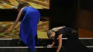 Tina Fey amp Amy Poehler Fall On Stage at Emmys 2013  iO Recap [upl. by Aserehc541]