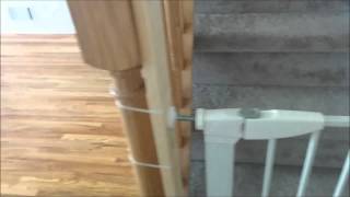 install safety gate on banister of staircase [upl. by Gensler]