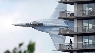 Crazy fighter jet pilot low pass between Australian city buildings [upl. by Tyrrell798]