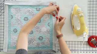 How to Hand Bind a Quilt featuring the Binding Tool  Fat Quarter Shop [upl. by Nilrak677]