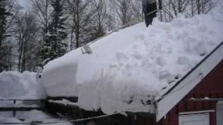 Removing snow from roof [upl. by Carling]