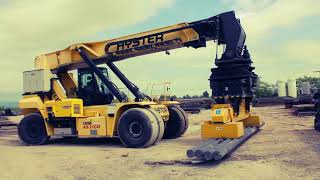 Steel bars handling double magnet on Hyster Reach Stacker [upl. by Animrac528]