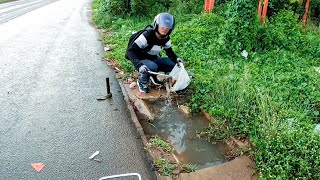 Unclogging Drain Water Blocked By Debris In Culvert Drain [upl. by Kask608]