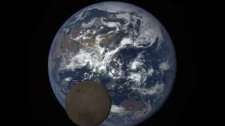 NASANOAA video EPIC camera catches moon passing between NOAAs DSCOVR satellite and Earth [upl. by Fenner]