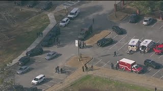 Officers actively searching for suspect in shooting at McEachern High parking lot [upl. by Mccarthy]