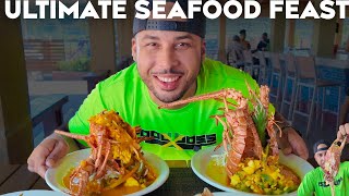 MASSIVE SEAFOOD FEAST OF KING CRAB LOBSTER AND FISH JAMAICA FOOD HISTORY AND CULTURE [upl. by Lleznod]