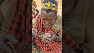 africa hunters hadzabe tribe woman eating dikdik meat [upl. by Zantos]