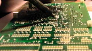 Removing and cleaning the 80017A voice chip in a Juno 106 [upl. by Reginauld670]