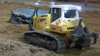 Liebherr 736 and Case Vibromax roller preparing the construction site [upl. by Netsew]