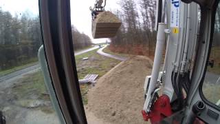 Takeuchi TB175 loading a Thwaites 6 tonne [upl. by Alyad397]