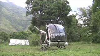 Flying a Medevac  Supply Hughes 269 piston helicopter around the small islands in the Philippines [upl. by Kemble]