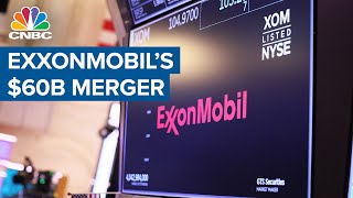 Exxon Mobil agrees to buy Pioneer Natural Resources for nearly 60 billion in allstock merger [upl. by Assille860]