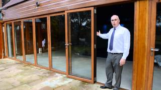 Bifold door 6 panel woodgrain finish aluminium [upl. by Verene]