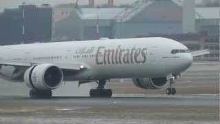 Boeing 777300ER Landing on wet runway with thrust reverse A6ECC Emirates [upl. by Laehpar]