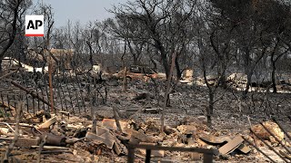 Residents count the cost of Greek wildfire [upl. by Emersen61]