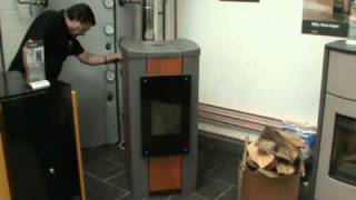 Rika Pellet stove loading pellets [upl. by Tegirb]