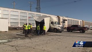 Video shows train slamming into tractortrailer stopped on South Carolina railroad tracks [upl. by Akiehsat]