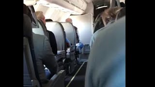 Passenger captures the moment flight was told to quotbrace for impactquot [upl. by Aikenahs]