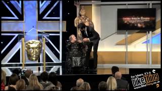 Sacha Baron Cohen  Charlie Chaplin Britannia Award  pushes woman in wheelchair off stage at awards [upl. by Mady]