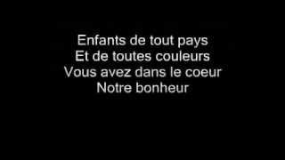 Enrico Macias  Enfants de Tous Pays  Lyrics [upl. by Arriaet541]