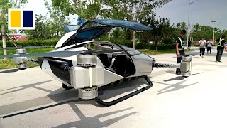 Experimental electric flying car takes to the air for test run in northern China [upl. by Airbmat]