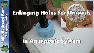 Enlarging holes for Uniseals in aquaponic system [upl. by Ahsiem]