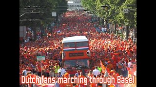 Dutch fans marching through Basel [upl. by Eiramlehcar]