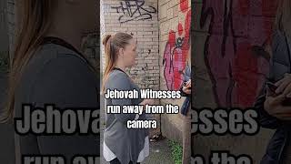 Jehovah Witnesses refuse to answer any questions and run away from the camera rome [upl. by Annawd]