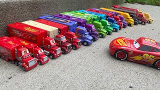 Lightning McQueen and other racers transport with Mack and haulers collection [upl. by Dnomsad]