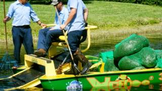 Palm Beach Aquatics  Lake Management The Weedoo Lake Surface Excavator [upl. by Akehsyt]