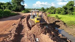 Skill operator using dozers KOMATSU D41P push long soil build road foundation crossing field [upl. by Martreb]