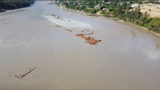 Debris floating down the Fraser River in Lillooet at the Old Bridge [upl. by Iru]