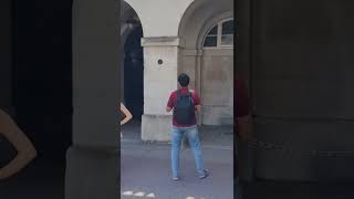 young boy runs in to the arch queens guard shouts get out horseguardsparade [upl. by Yenitsed]