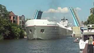 Manitowoc Great Lakes Freighter Navigates Narrow Channel In Manistee Michigan [upl. by Fleck932]