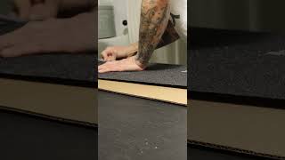 Applying griptape on a Russ Howell DECOMPOSED skateboard deck [upl. by Eirrej]