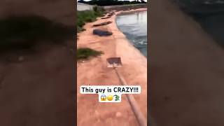 Man faces off against 8 alligators 😱😖🐊 crazy alligator wow nature lol funnyshorts shorts [upl. by Inoy]