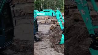 Kobelco SK75SR on the job [upl. by Akinimod]