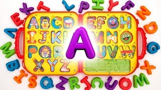 Teach Kids ABCs with Elmos On the Go Letters Puzzle [upl. by Nylahsoj]