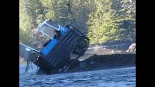 dozer boat being lifted by air crane in Rivers Inlet [upl. by Einiffit61]