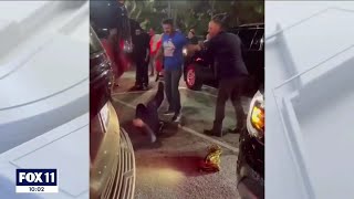 ATTACK REACTION VIDEO OF Couple beaten in Dodger Stadium parking lot after Elton John concert [upl. by Previdi997]