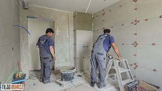 Bathroom tiling with 60x120 tilesBadkamer betegelen met tegels van 60x120installing tiles 60x120 [upl. by Karlan319]