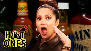 Salma Hayek Adopts Sean Evans While Eating Spicy Wings  Hot Ones [upl. by Kronick592]