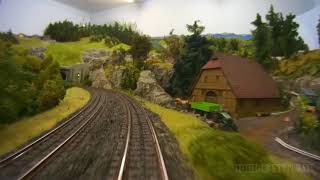 Cab ride on a model railroad layout with hidden railway station in HO scale [upl. by Moss145]