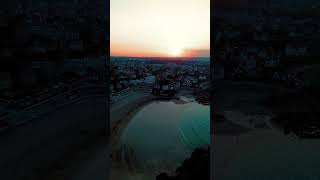 Sunset Over a Beachside City  Stunning Drone Footage of Coastal Urban Beauty sunset drone travel [upl. by Spoor]