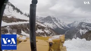 Nervewracking Glacier National Park Snowplowing [upl. by Yenffad99]