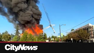 Crane falls as Vancouver firefighters battle blaze [upl. by Oriel]