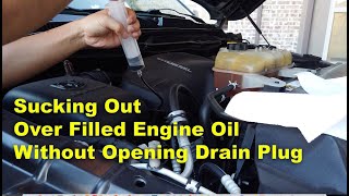 Sucking Out Over Filled Engine Oil Without Opening Drain Plug [upl. by Elfie797]