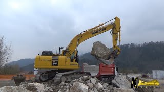 KOMATSU PC 290 11 EXCAVATOR LOADING BIG ROCKS ON TRUCK [upl. by Enelrahs392]