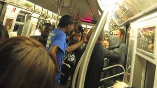 FIGHT ON NYC SUBWAY Black Diva standsup and schools Homophobic African Must see Action [upl. by Docia]