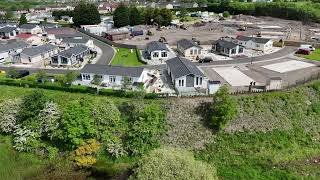 Aerial of Red Deer Village and Cardowan Moss Nature Reserve [upl. by Lonnard]